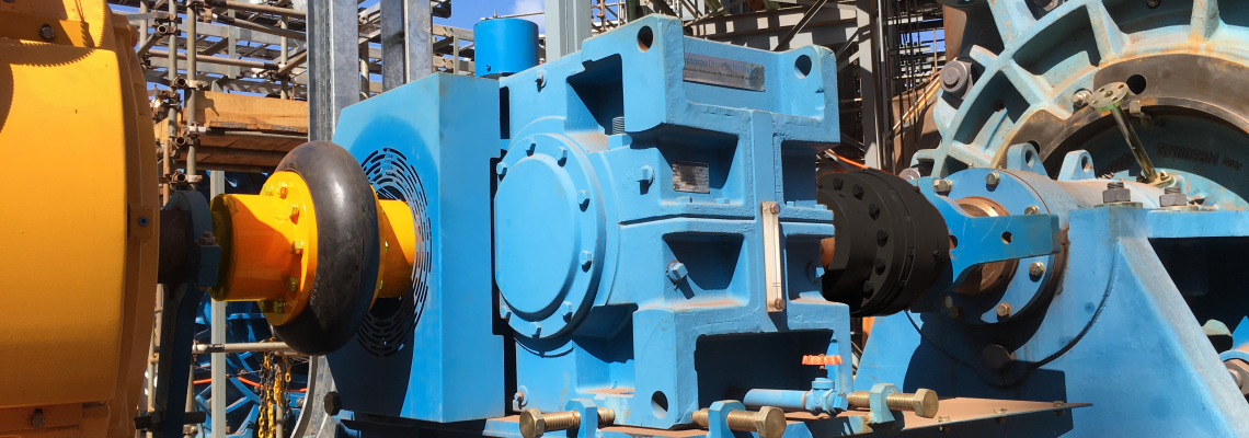Antares flexible coupling installed on a slurry pump system, connecting a gearbox and motor in an industrial setting.