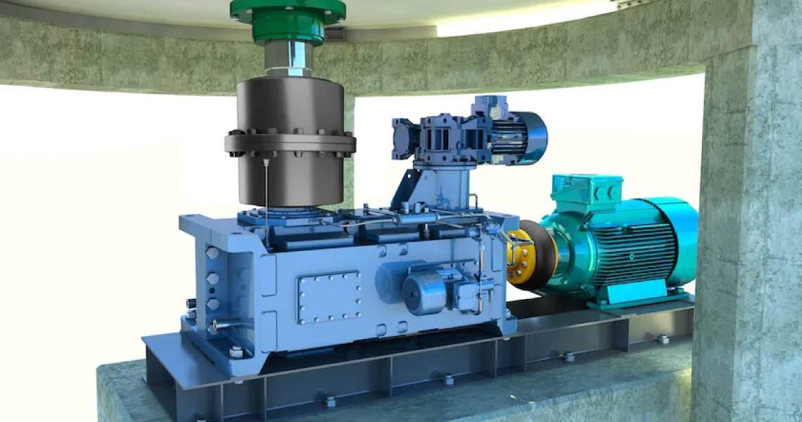 3D rendering of an Antares AGS V HD gear coupling installed on the top shaft of a soybean desolventizer, with an elastic coupling connecting the drive motor to the gearbox in an oilseed processing plant.